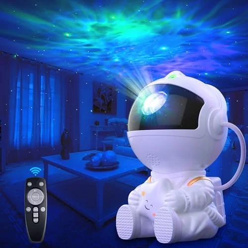 Astronaut-shaped galaxy projector with remote control projecting colorful lights across a living room ceiling